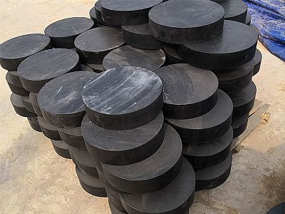 伊宁市板式橡胶支座由若干层橡胶片与薄钢板经加压硫化